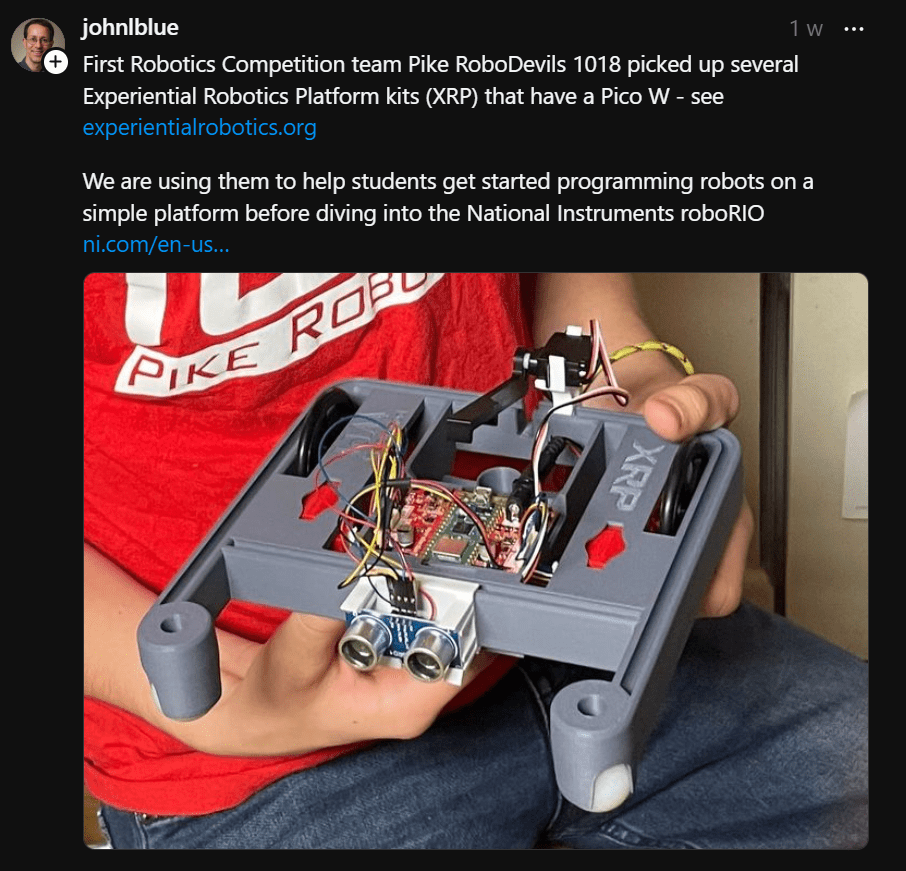 Screen grab of some one holding a digi key first robotics robot kit